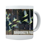 Wild urban parrot coffee mug